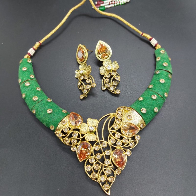 Beautiful green necklace set in polki kundan by Anaghya